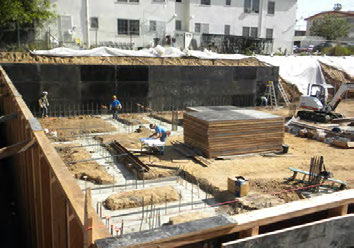 Luxury estate patio and retaining wall hardscape in San Diego, California