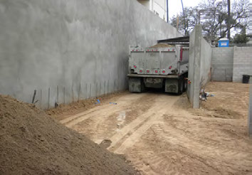 KIA Contractors site logistics and material staging on an active job site